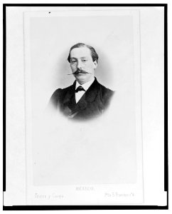 Head-and-shoulders portrait of a man with handlebar mustache, facing front LCCN2005692503