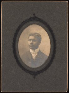 Head-and-shoulders portrait of a young man, seated, facing left LCCN2015650130