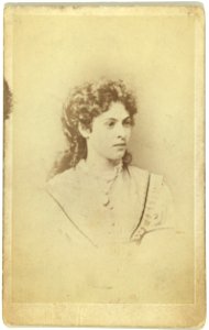 Head-and-shoulders portrait of woman facing right LCCN99615650