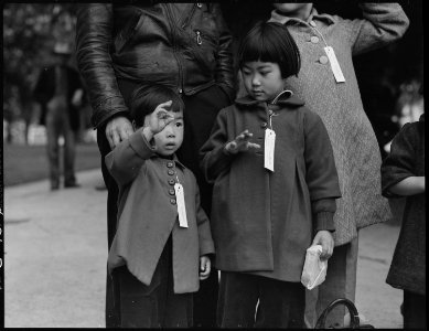 Hayward, California. Two children of the Mochida family who, with their parents are awaiting evacua . . . - NARA - 537506 photo