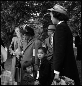 Hayward, California. This family of Japanese ancestry are about to board the bus for an Assembly cen . . . - NARA - 537503 photo