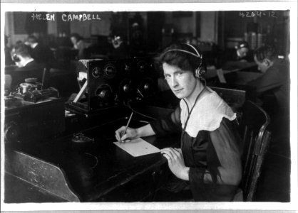 Helen Campbell, first wireless operator of Natl. League for Women's Service, half length portrait, seated at wireless telegraph, facing left LCCN2005696170