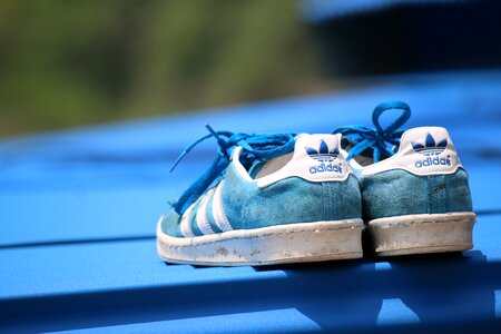 Blue adidas shoes photo