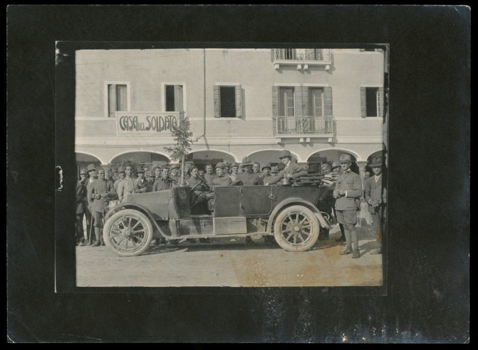 Helen Johns Kirtland in open car surrounded by Italian soldiers near Piave River, Italy LCCN2016652132