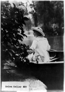 Helen Keller in a boat by shore LCCN2002706629