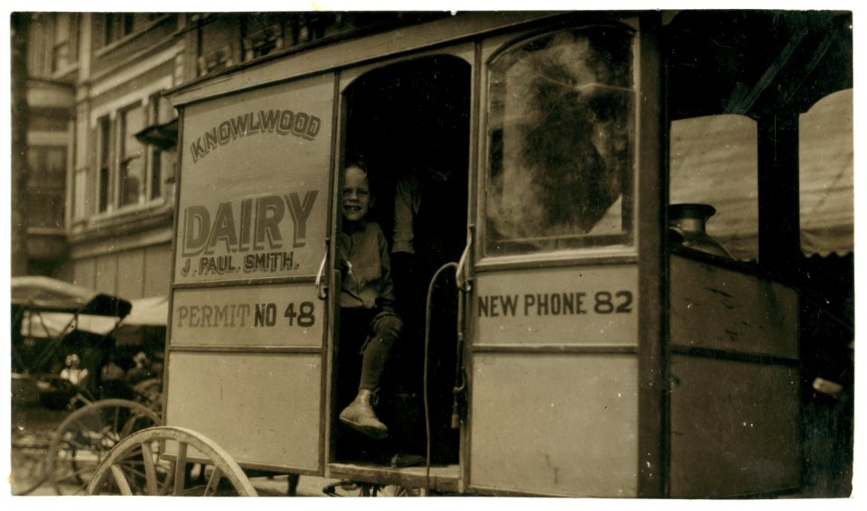 Helper on a dairy wagon. See report. LOC nclc.03971