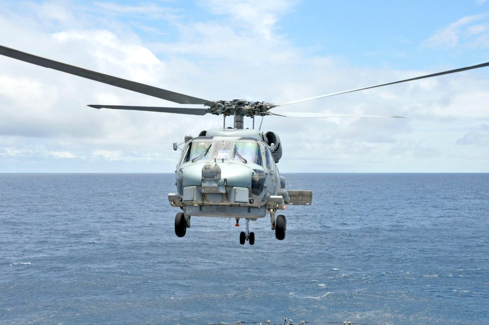 Helicopter takes off from USS Rentz 130921-N-IC228-006