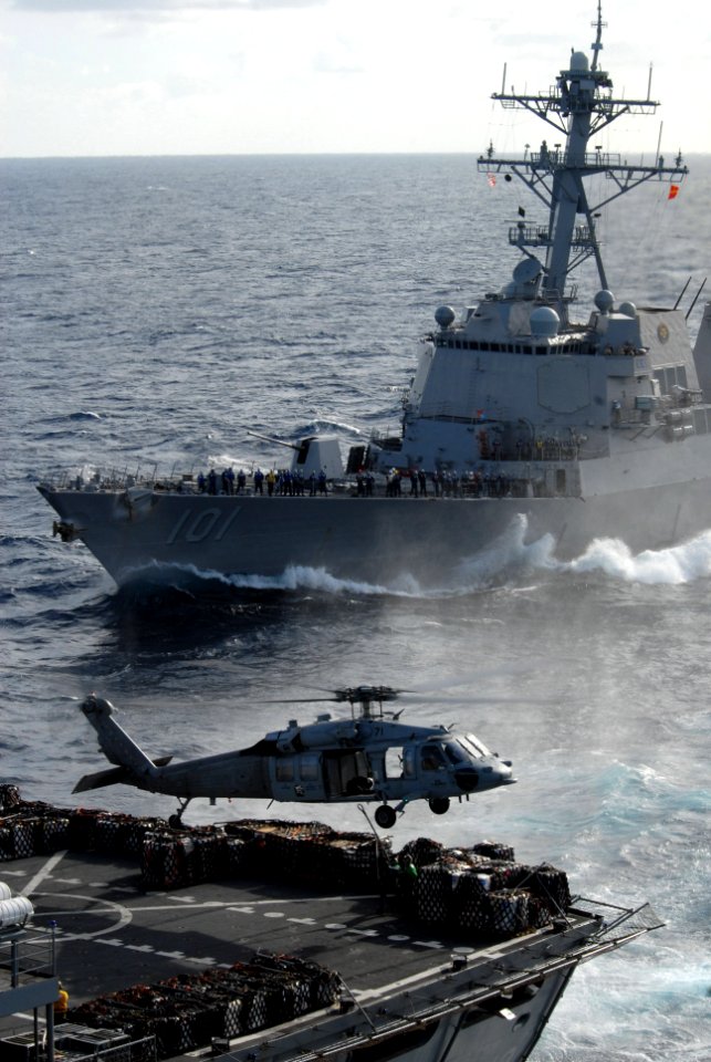 Helicopters and ships work together on vertical replenishment DVIDS110888
