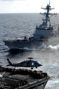 Helicopters and ships work together on vertical replenishment DVIDS110888