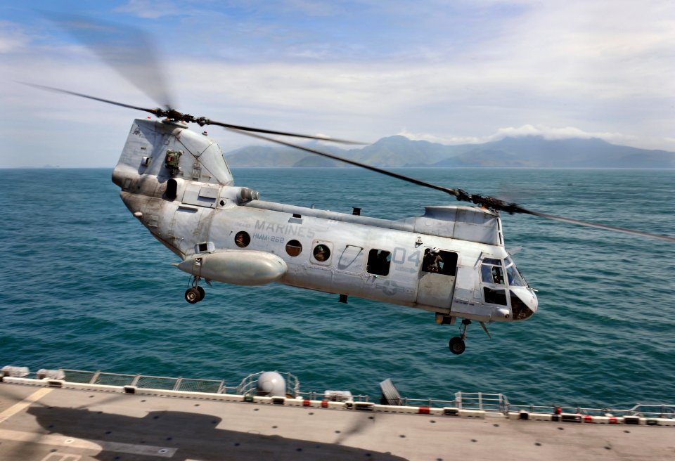Helicopters take off from USS Bonhomme Richard during PHIBLEX 121005-N-KB563-199