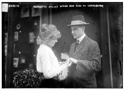 Henrietta Mielke giving iron ring to contributor LCCN2014697858