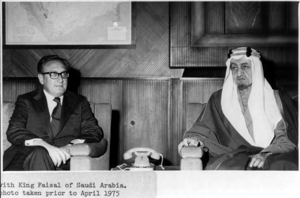 Henry Kissinger and King Faisal of Saudi Arabia seated, prior to April 1975 LCCN2002705598