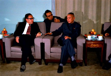 Henry Kissinger and a Chinese Official have Tea during a Revolutionary Opera Performance Intermission