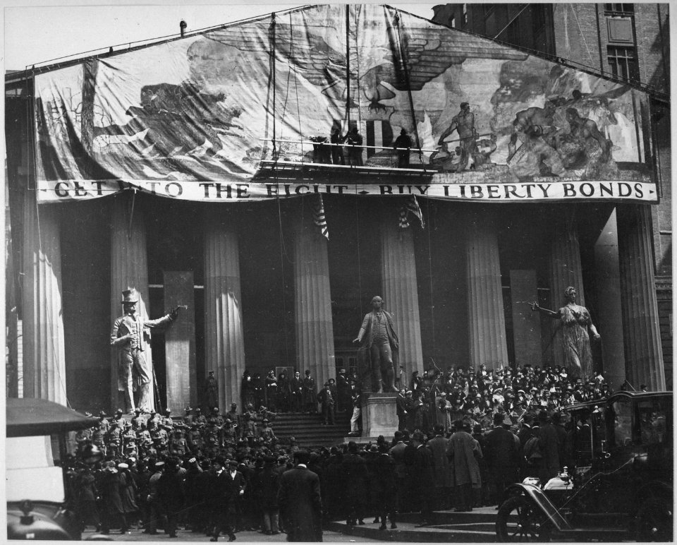 Henry Reuterdahl (Lieutenant U.S. Naval Reserve) and N.C. Wyeth, noted artists, putting the last touches on the giant ba - NARA - 533473