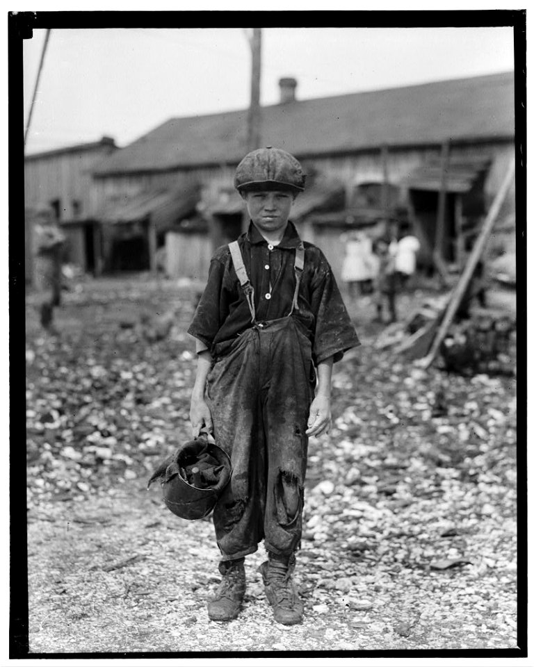 Henry, 10 year old oyster shucker who does five pots of oyster (sic) a day. Works before school, after school, and Saturdays. Been working three years. Maggioni Canning Co. LOC nclc.05334