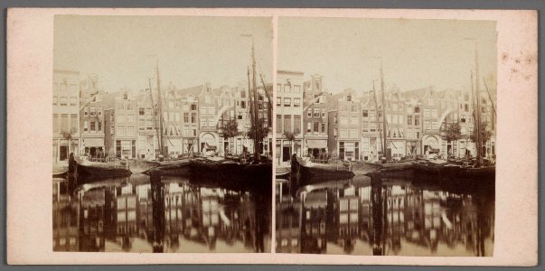 Het Damrak te Amsterdam-001