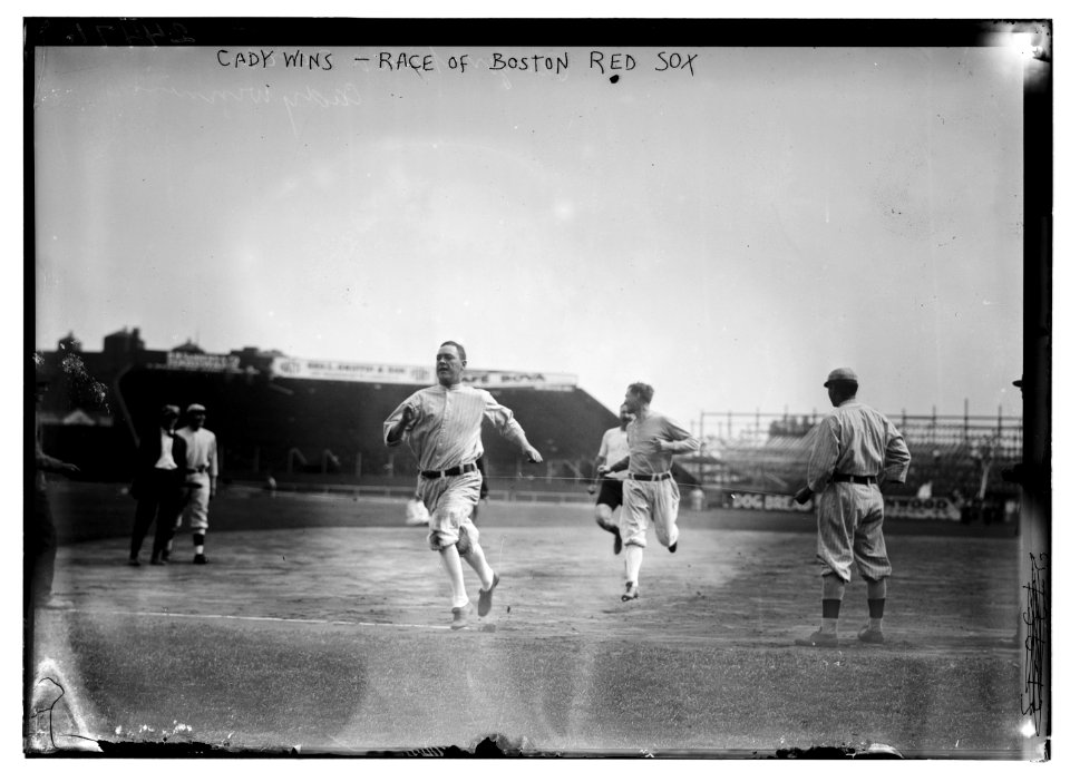 Hick Cady of Boston Red Sox wins foot race with Jack O'Brien (Boston Red Sox trainer, pin shorts, partially obscured) and teammate Buck O'Brien (looking to his right) at Fenway Park, Boston LCCN2014690839