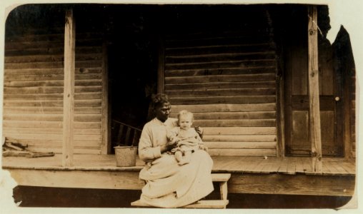 Higginbotham baby stays at home with negro nurse. Father and mother work in West Point Cotton Mill. I found three families in this small settlement, that do this way. LOC nclc.02038