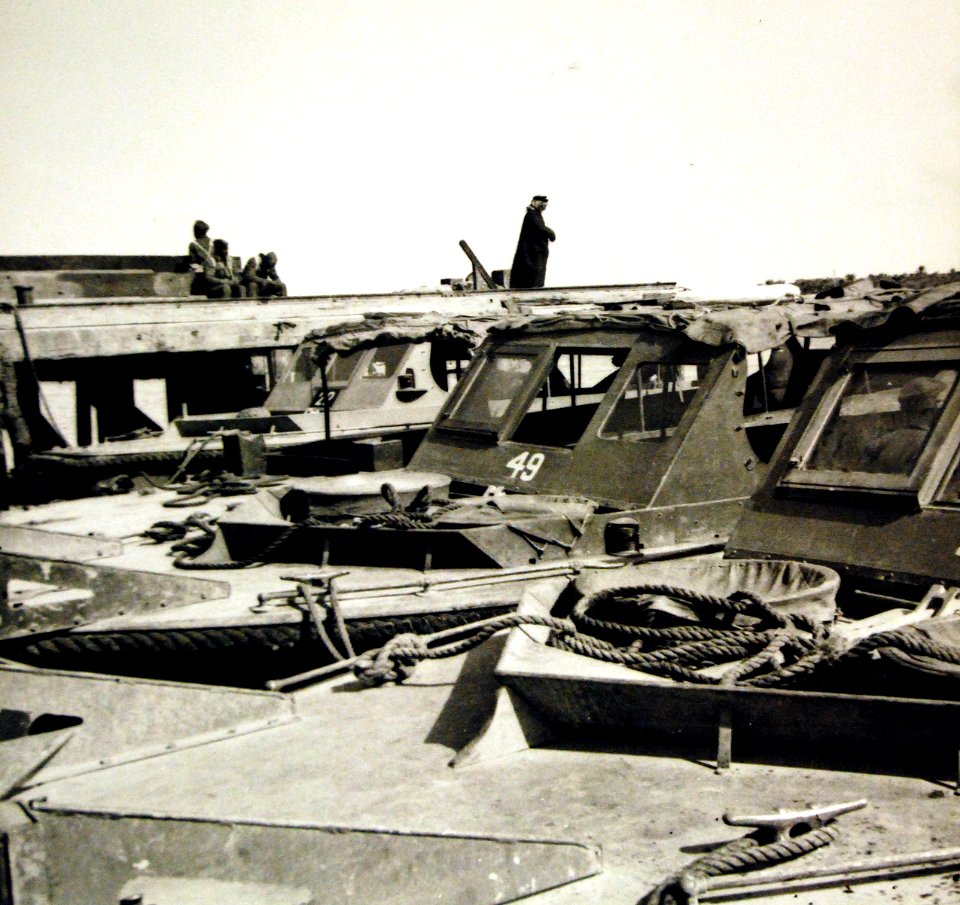 Higgins speedboats in a port in the Middle East, March 1943 (24997654385)