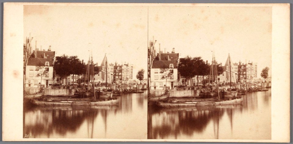 Het Oosterdok gezien in de richting van het Kamperhoofd met de Schreierstoren (thans Prins Hendrikkade) met links het hoekhuis Prins Hendrikkade 99