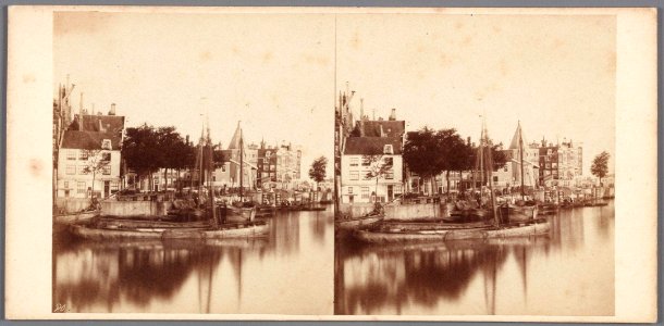 Het Oosterdok gezien in de richting van het Kamperhoofd met de Schreierstoren (thans Prins Hendrikkade) met links het hoekhuis Prins Hendrikkade 99 photo