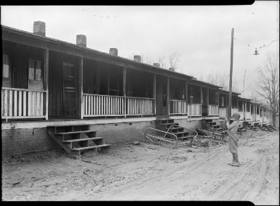 High Point, North Carolina - Housing. Row of shacks occupied by colored textile and furniture workers - High Point... - NARA - 518532