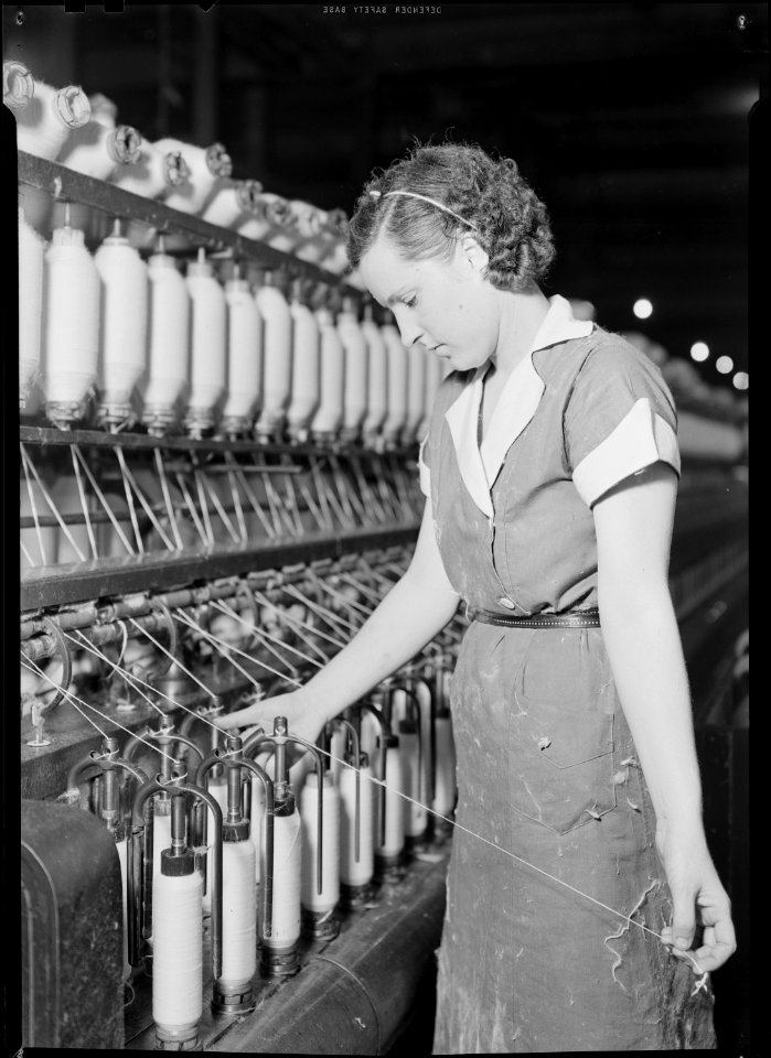 High Point, North Carolina - Textiles. Pickett Yarn Mill. Speeder - doffer putting up ends - highly skilled - NARA - 518510
