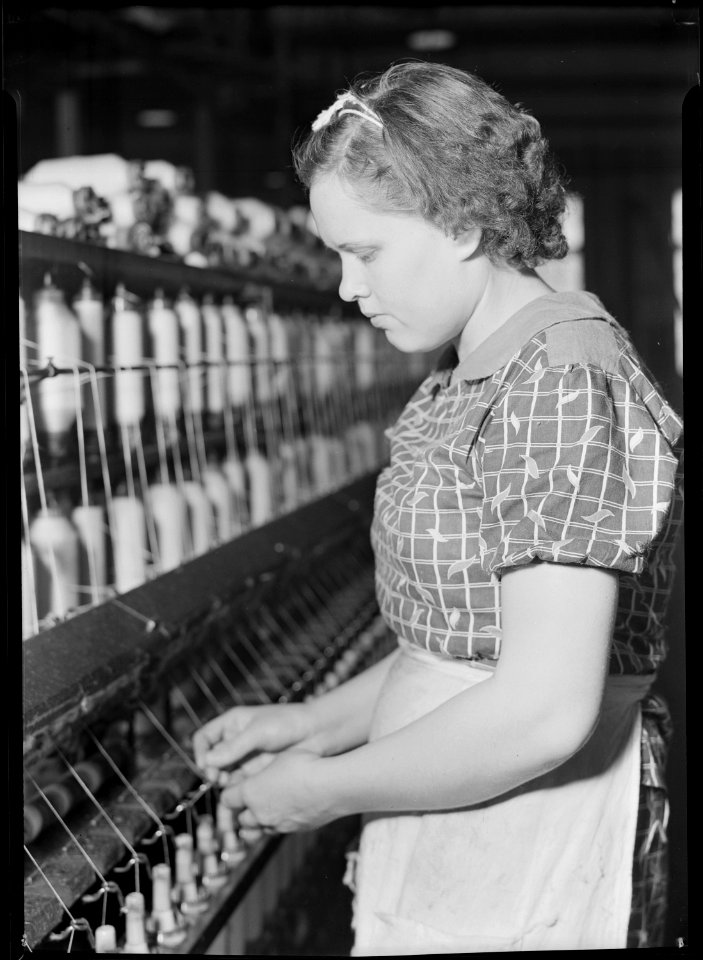 High Point, North Carolina - Textiles. Pickett Yarn Mill. Spinner - highly skilled - about 3 to 4 years to learn... - NARA - 518514