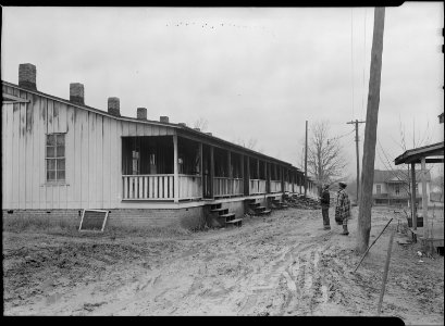 High Point, North Carolina - Housing. Row of shacks occupied by colored textile and furniture workers - High Point... - NARA - 518533