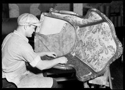 High Point, North Carolina - Upholstering. Tomlinson Chair Manufacturing Co. Applying hair in the upholstery of chair... - NARA - 518479
