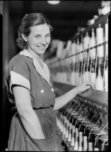 High Point, North Carolina - Textiles. Pickett Yarn Mill. Spinner - personality - woman picture - NARA - 518515