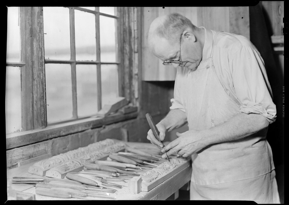 High Point, North Carolina - Upholstering. Tomlinson Chair Manufacturing Co. Hand carver - making master model for... - NARA - 518493
