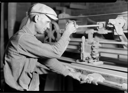 High Point, North Carolina - Upholstering. Tomlinson Chair Manufacturing Co. Automatic stroke (HGS) - sander ... - NARA - 518498