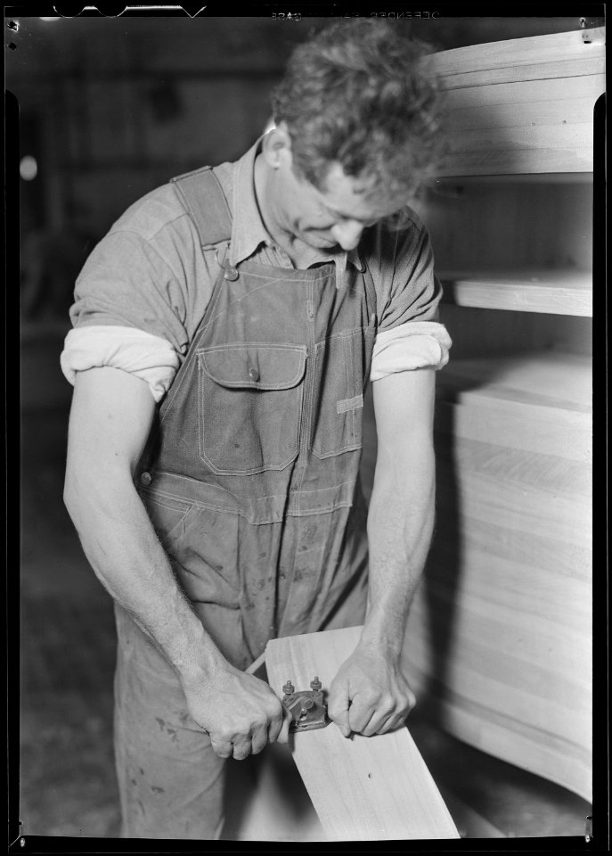 High Point, North Carolina - Upholstering. Tomlinson Chair Manufacturing Co. Case fitting - making the cases become a... - NARA - 518492