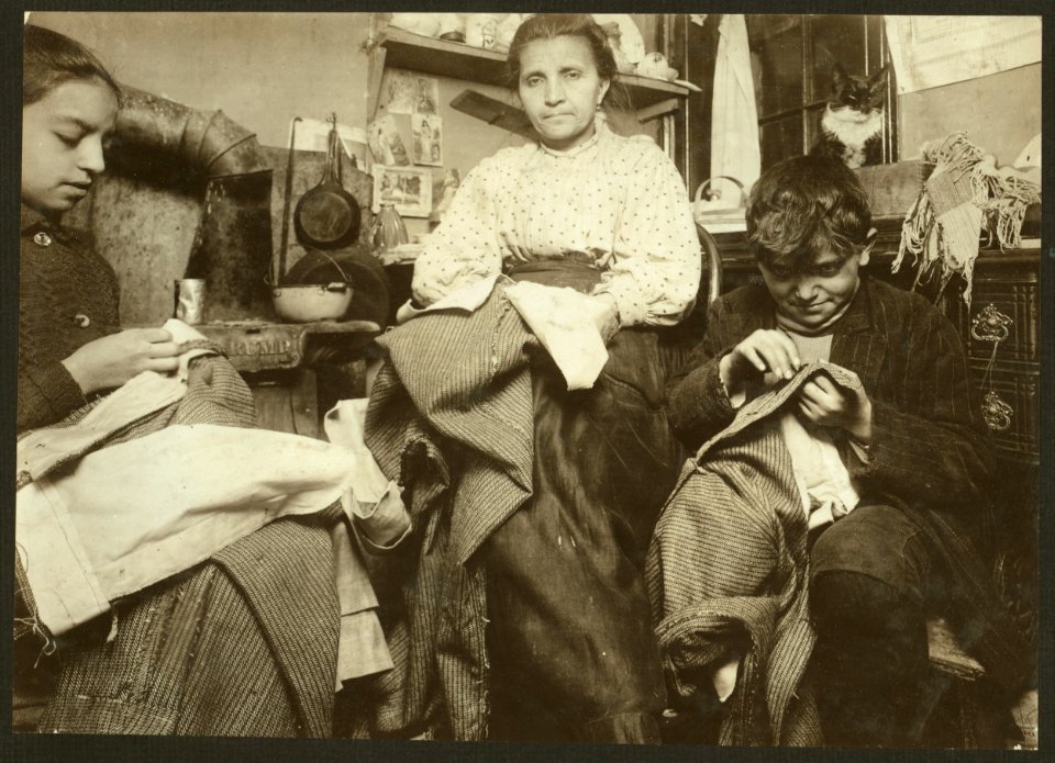 High up on the top floor of a rickety tenement, 214 Elizabeth St., N.Y., this mother and her two children, boy 10 years old and the girl 12, were living in a tiny one room, and were LOC cph.3b03540