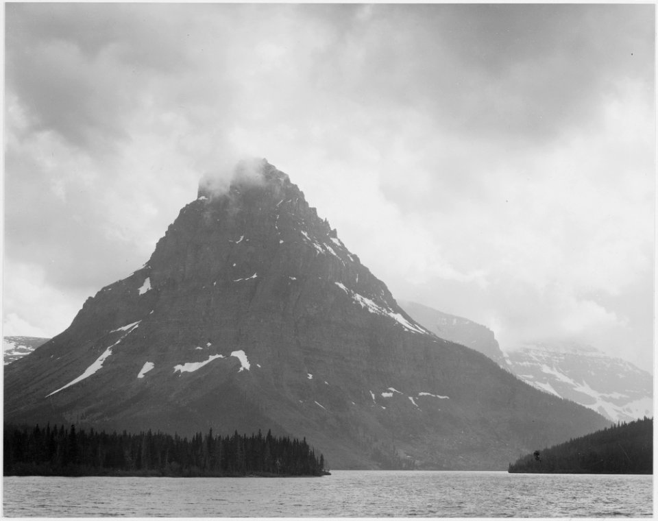 High, lone mountain peak, lake in foreground, Two Medicine Lake. Glacier National Park, Montana., 1933 - 1942 - NARA - 519865