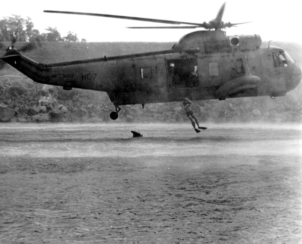 HH-3A Sea King of HC-7 drops rescue swimmer off NAS Cubi Point in January 1974 (NNAM.2011.113.381)