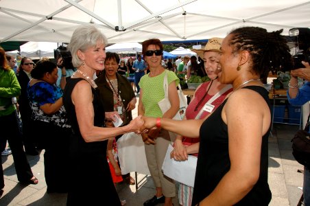 HHS Secretary Kathleen Sebelius talks with women at the HHS Farmer's Market