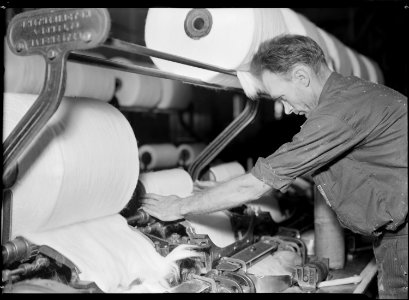 High Point, North Carolina - Textiles. Pickett Yarn Mill. Combers operative - very skilled - most complicated machine... - NARA - 518507 photo