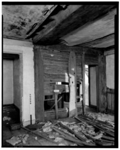 Historic American Buildings Survey L. C. Durette, Photographer SOUTH WEST ROOM 2nd. FLOOR CHIMNEY GIRT HAS BEEN CUT BACK TO MAKE LATER PLASTER WALL FLUSH - Doe Garrison, Lamprey HABS NH,8-NEWM,1-37