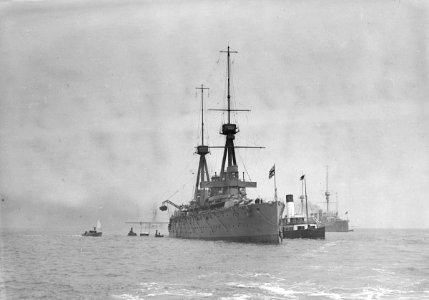 HMS 'Invincible' (1907) anchored at Spithead. RMG P00035