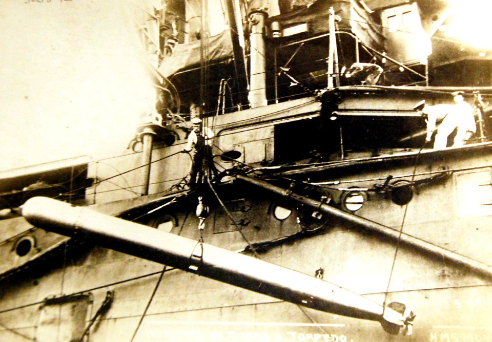 HMS Monarch, Orion-class battleship, hoisting in a torpedo, Royal Navy. WWI (30238952801)