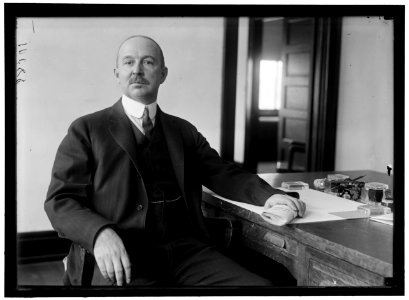 HOLDEN, HALE. AT DESK LCCN2016868812