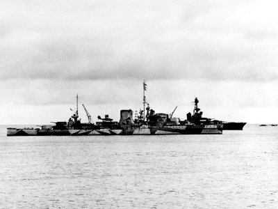 HMNZS Leander (75) and USS Chicago (CA-29) at anchor off Suva in February 1942 (80-G-7294)