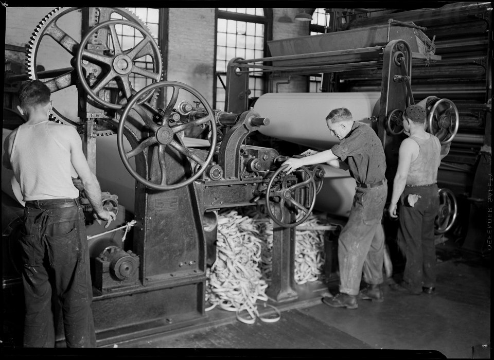 Holyoke, Massachusetts - Paper. American Writing Paper Co. Rewinding paper from reel. - NARA - 518327