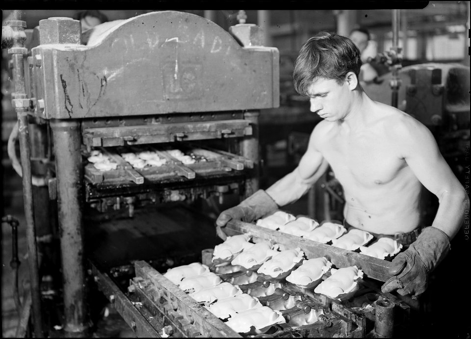 Holyoke, Massachusetts - Paragon Rubber Co. and American Character Doll. Pressing rubber bodies (French). - NARA - 518343