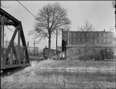 Holyoke, Massachusetts - Scenes. A very old independent paper mill, wood pulp, not rags, continuing site and... - NARA - 518353
