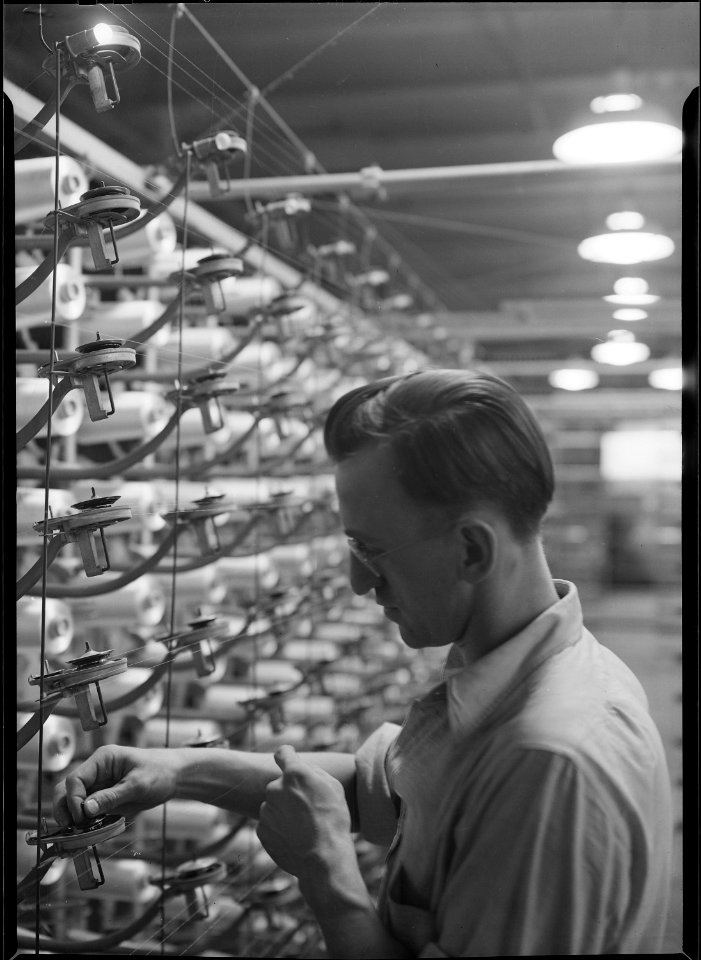Holyoke, Massachusetts - Silk. William Skinner and Sons. Rayon warping - cone creel. - NARA - 518319