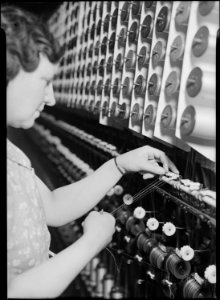 Holyoke, Massachusetts - Silk. William Skinner and Sons. Setting up twisting-in machine (German). - NARA - 518311