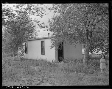 Home of Dan Marques, miner, living in company housing project. This mine has open shop but pays its miners union... - NARA - 540441